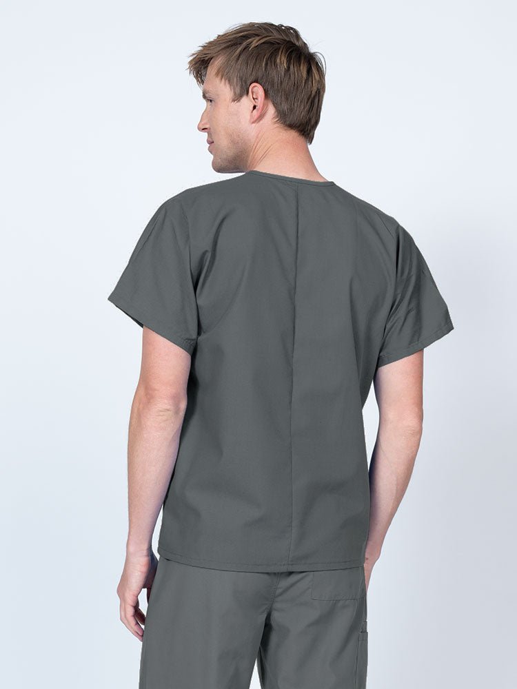 Male nurse wearing a Luv Scrubs Unisex Single Pocket V-Neck Scrub Top in pewter with a lightweight, breathable fabric made of 55% Cotton and 45% Polyester.