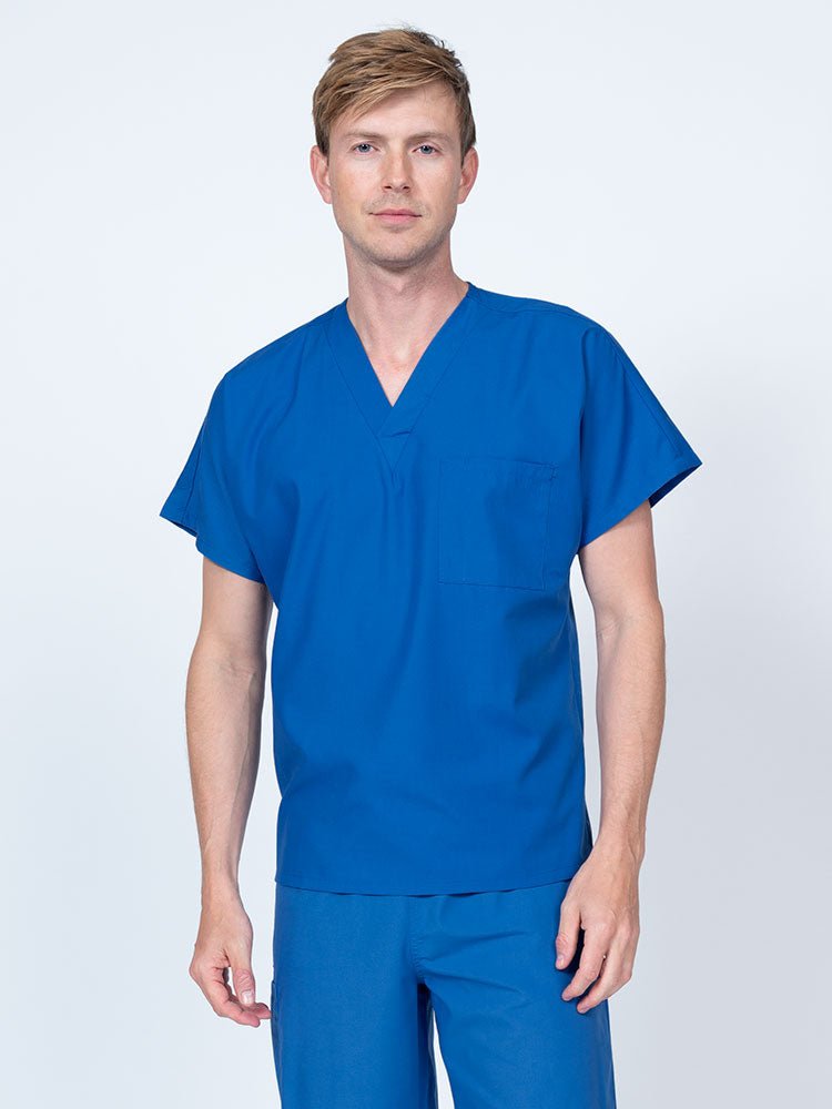 Man wearing a Luv Scrubs Unisex Single Pocket V-Neck Scrub Top in royal with dolman sleeves and 1 chest pocket.