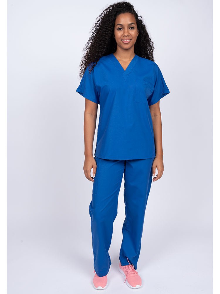 Young woman wearing a Luv Scrubs Unisex Single Pocket Scrub Top in royal featuring a V-neckline.