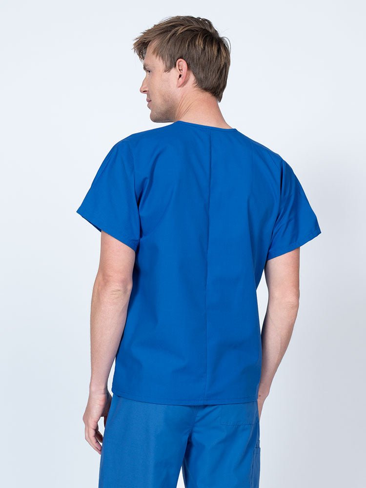 Male nurse wearing a Luv Scrubs Unisex Single Pocket V-Neck Scrub Top in royal with a lightweight, breathable fabric made of 55% Cotton and 45% Polyester.