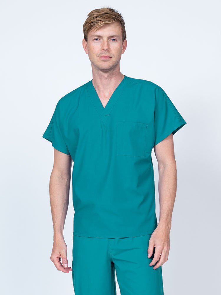 Man wearing a Luv Scrubs Unisex Single Pocket V-Neck Scrub Top in teal with dolman sleeves and 1 chest pocket.