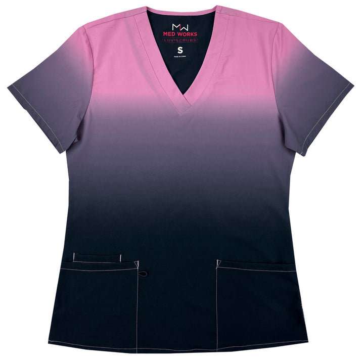 The front of the Luv Scrub by MedWorks Ombre Scrub Top in Light Pink featuring a unique polyester/spandex silky fabric.