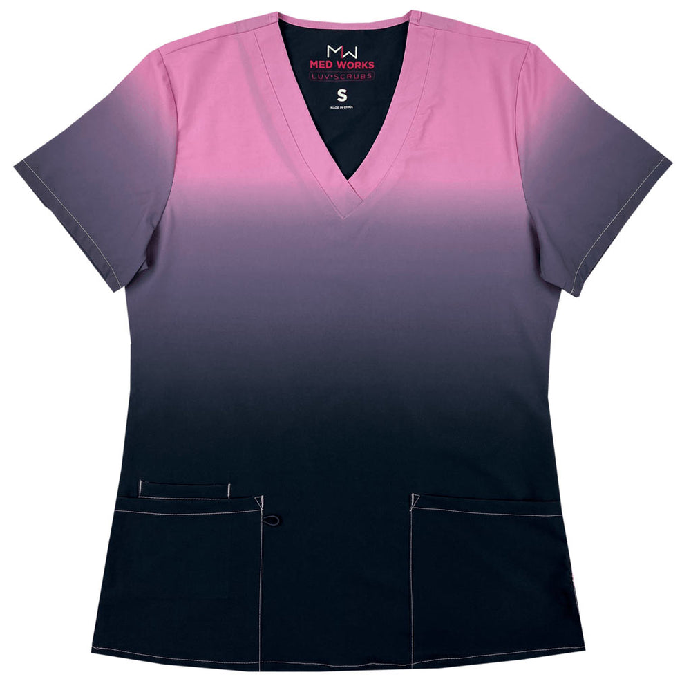 The front of the Luv Scrub by MedWorks Ombre Scrub Top in Light Pink featuring a unique polyester/spandex silky fabric.