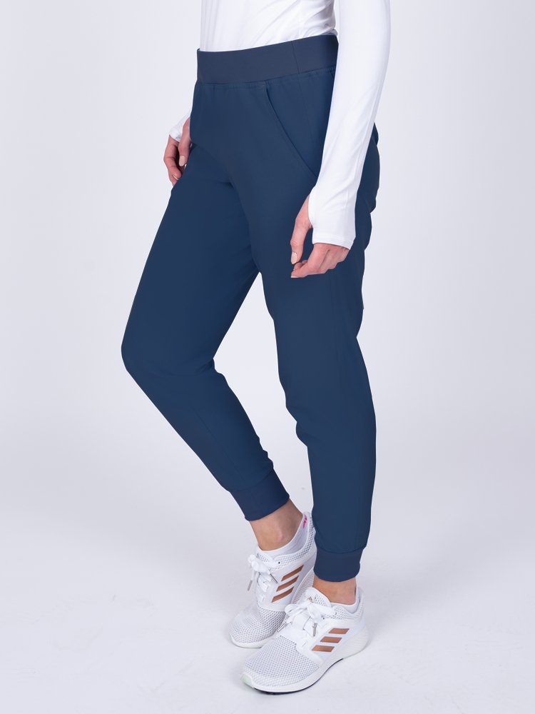 Meraki Sport Women's Jogger Scrub Pant in navy featuring comfortable lightweight fabric