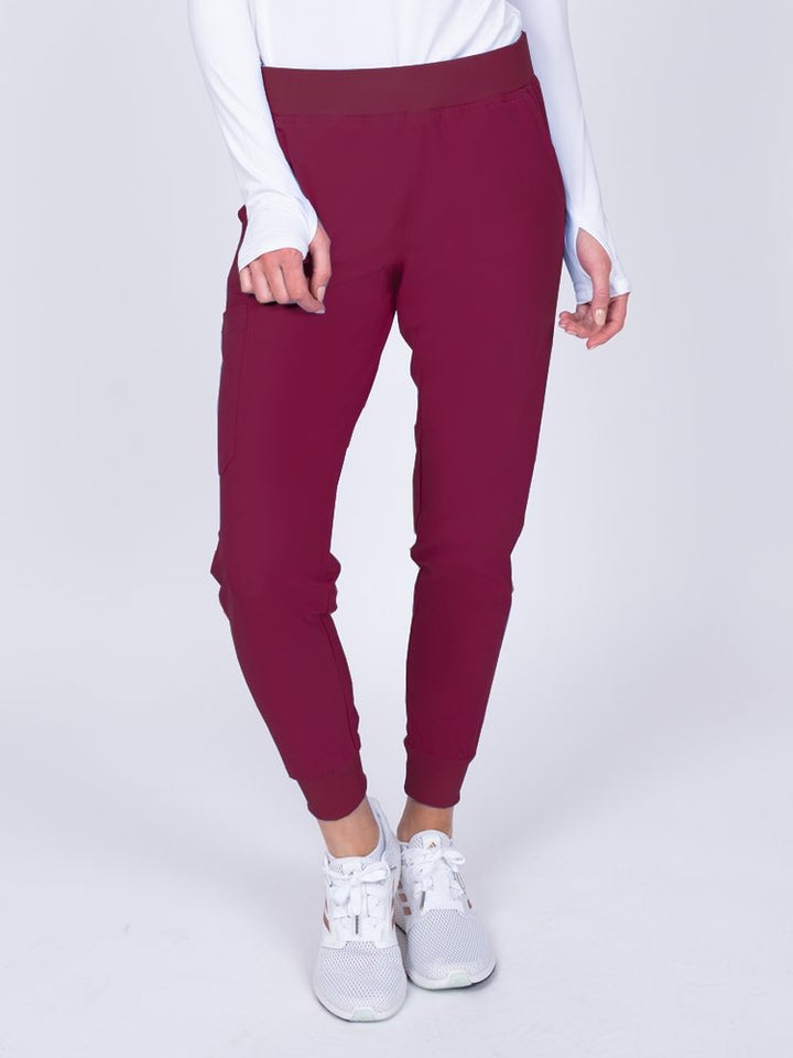 Meraki Sport Women's Jogger Scrub Pant in wine featuring rib knit hem cuffs for adjustability