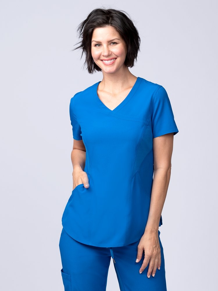 Meraki Sport Women's Mock Wrap Scrub Top in royal featuring front princess seams to provide a flattering fit