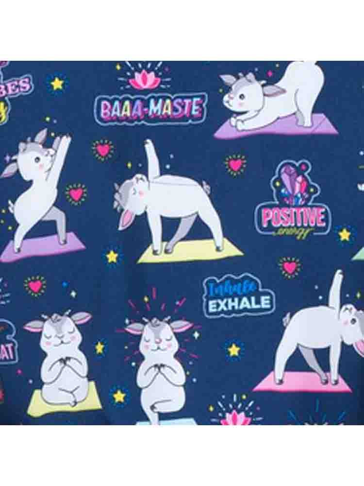 A close look at the print "Baa-maste" from Meraki Sport featuring cartoon sheep doing yoga on a navy blue background.