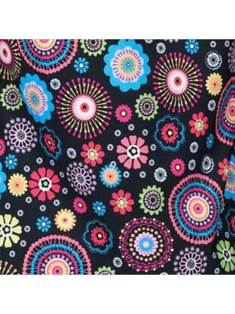 A close look at the print "Cute n Cool" from Meraki Sport featuring a vibrant, multi-colored paisley design on a black background.