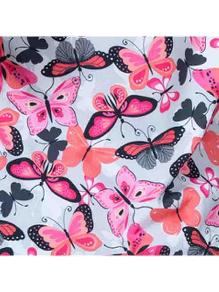 A close look at the print "Enchanted Spirit" from Meraki Sport featuring multi-colored butterflies in shades of pink, orange and grey on a light grey background.