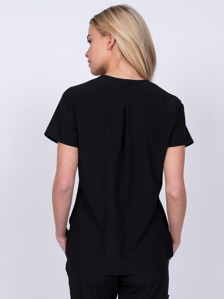 Meraki Sport Women’s Tuck-In Scrub Top in black featuring a slight high low curved hemline