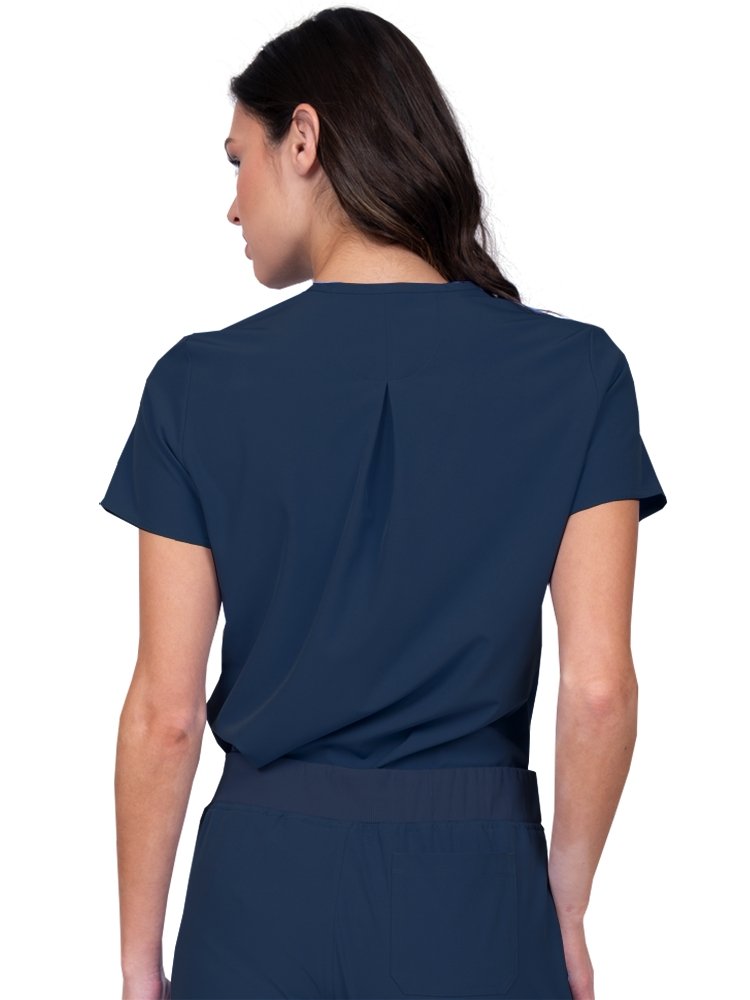 Meraki Sport Women’s Tuck-In Scrub Top in navy featuring Back inverted pleat