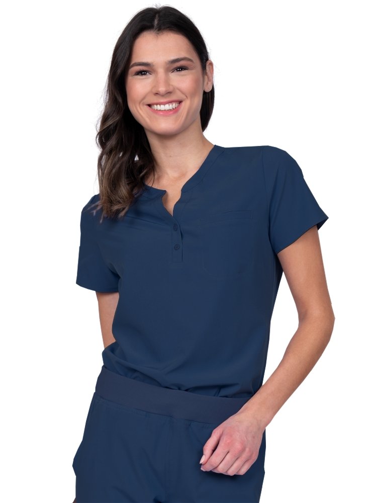 Meraki Sport Women’s Tuck-In Scrub Top in navy featuring a Henley neckline with 2-button placket