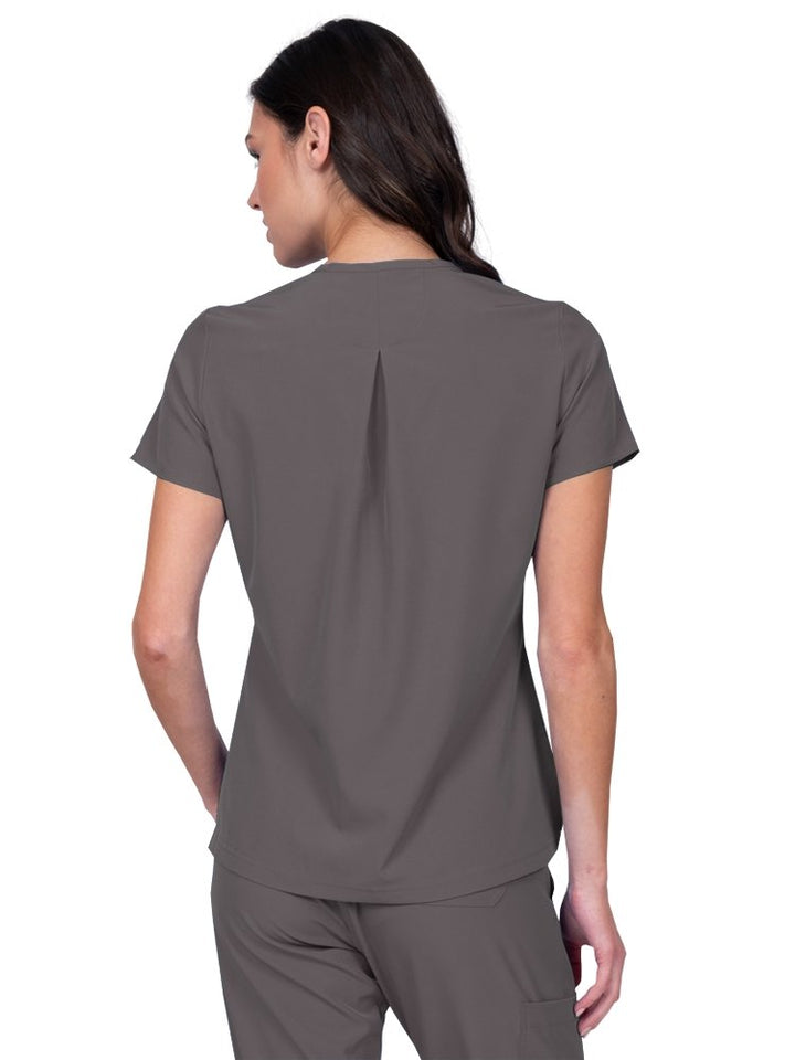 Meraki Sport Women’s Tuck-In Scrub Top in pewter featuring a slight high low curved hemline