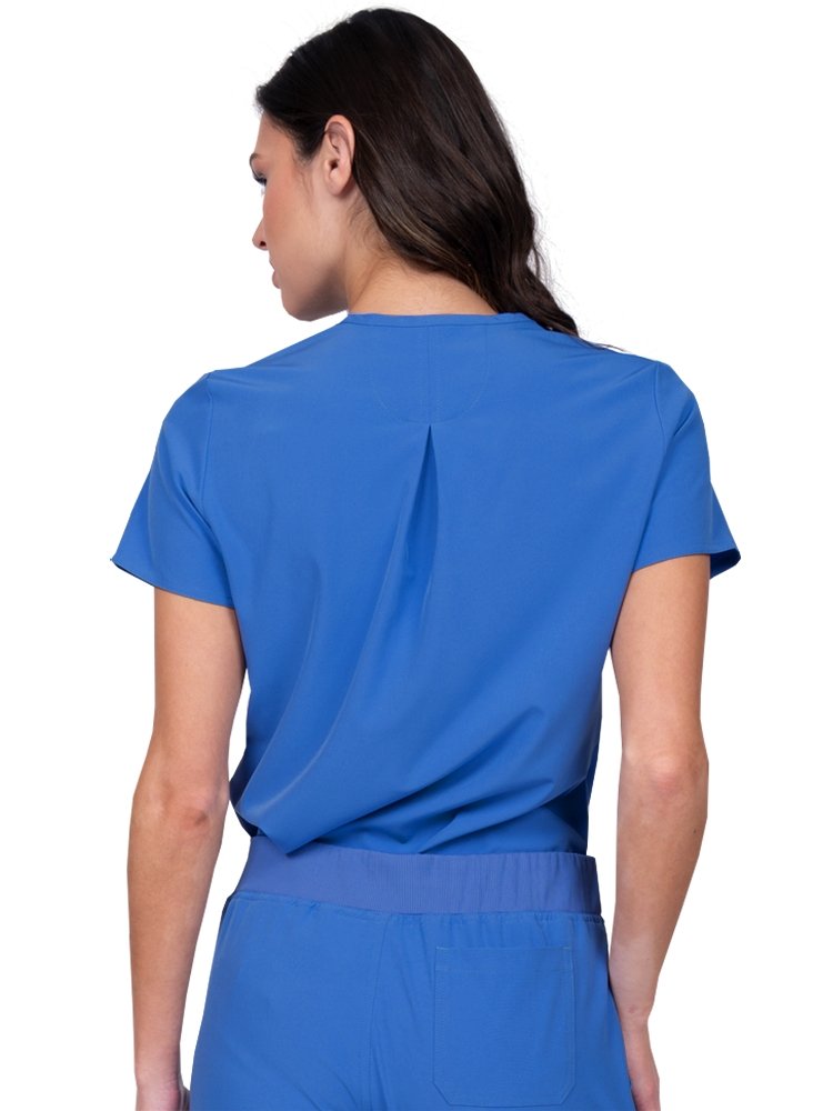 Meraki Sport Women’s Tuck-In Scrub Top in royal featuring Back inverted pleat