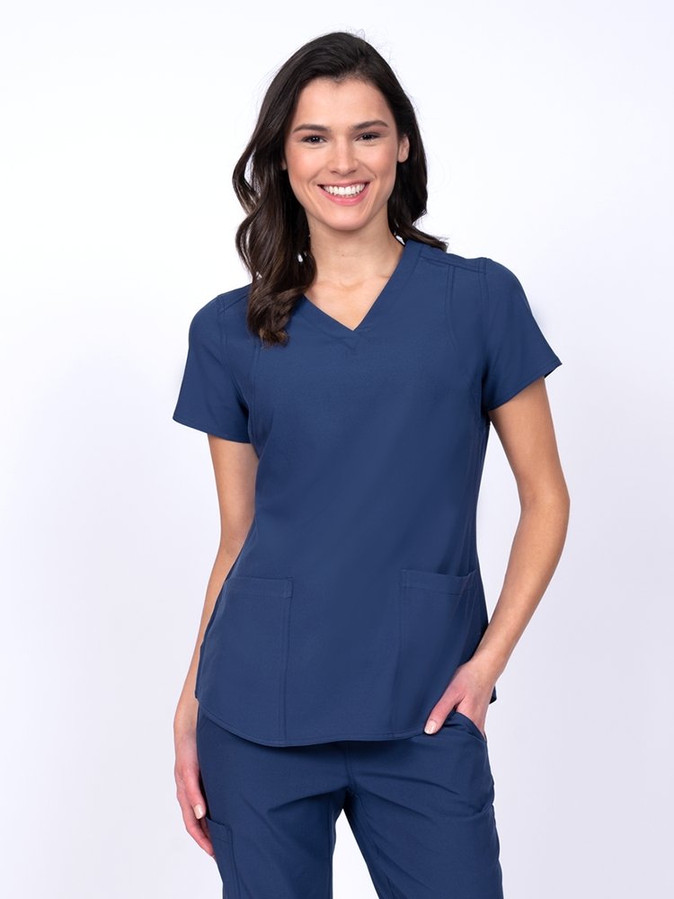 Meraki Sport Women's V-Neck Scrub Top in navy featuring 4-way stretch fabric for added mobility