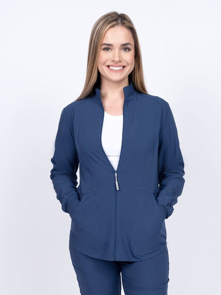 Meraki Sport Women's Zip Front Scrub Jacket in navy featuring 4-way movement stretch fabric