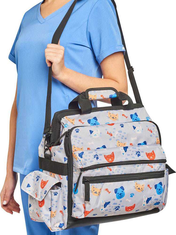 The Nursemates Ultimate Bag in "Furry Faces" featuring multiple compartments for maximum storage room.