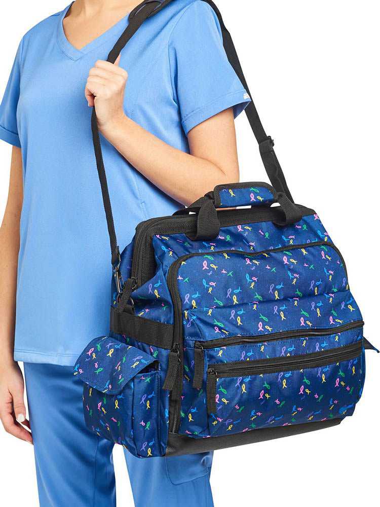 The Nursemates Ultimate Bag in "Ribbons & Hearts" featuring multiple compartments for maximum storage room. 