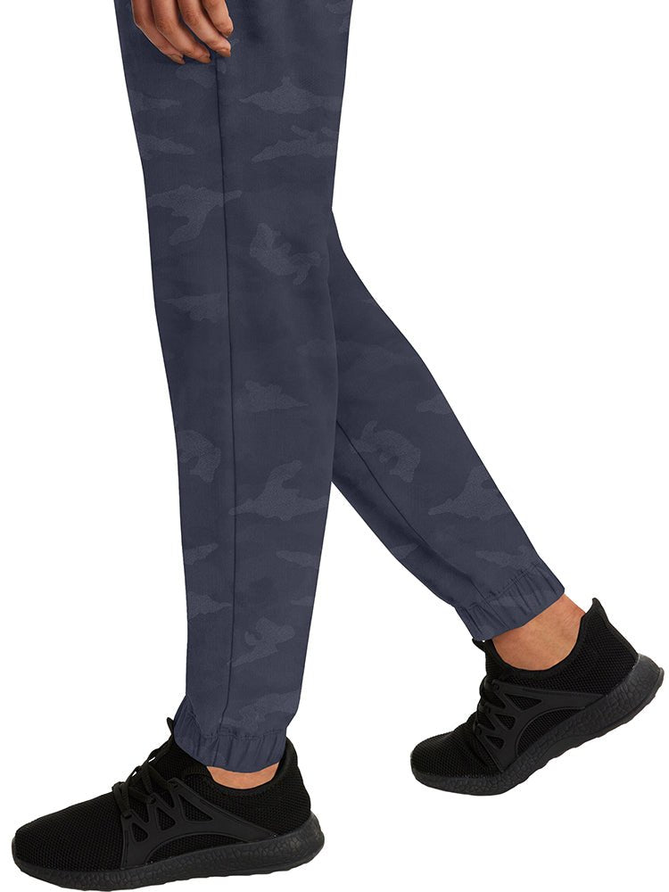 Nurse wearing a pair of Purple Label Women's Tate Camo Joggers in Pewter with unique, quick drying fabric. 