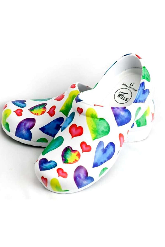 An image of the "Rainbow Hearts" StepZ Women's Slip Resistant Memory Foam Clog in size 8 featuring patented water-based fluid slip-resistance technology.
