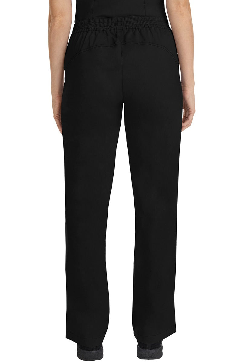 A female CNA wearing a pair of Purple Label Women's Taylor Drawstring Scrub Pants in Black featuring a back yoke to ensure comfortable & flattering all day fit.
