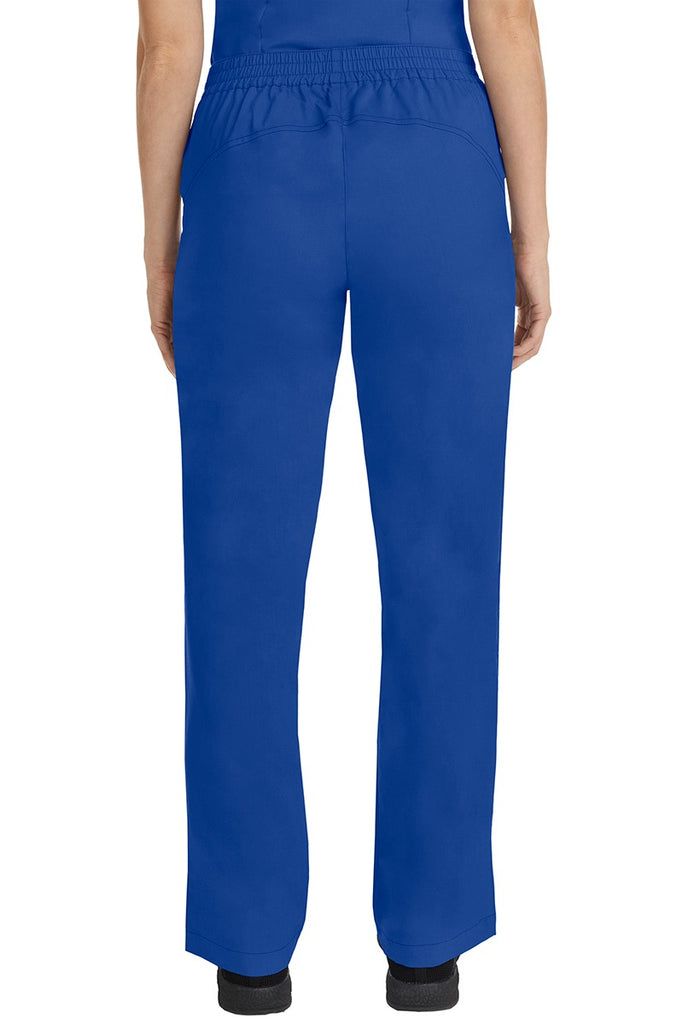 A female CNA wearing a pair of Purple Label Women's Taylor Drawstring Scrub Pants in Galaxy Blue featuring a back yoke to ensure comfortable & flattering all day fit.