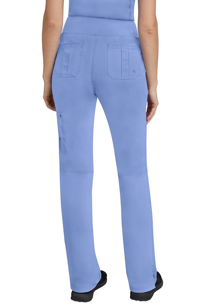 A lady CNA wearing a pair of Women's Tori Yoga Waistband Scrub Pants from Purple Label in Ceil featuring 2 back patch pockets for additional on the job storage room.