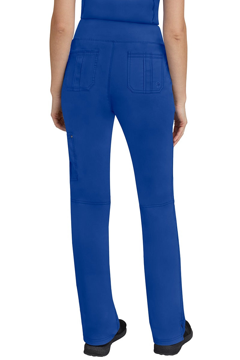 A lady CNA wearing a pair of Women's Tori Yoga Waistband Scrub Pants from Purple Label in Galaxy Blue featuring 2 back patch pockets for additional on the job storage room.