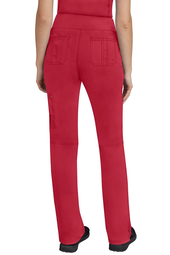 A lady CNA wearing a pair of Women's Tori Yoga Waistband Scrub Pants from Purple Label in Red featuring 2 back patch pockets for additional on the job storage room.