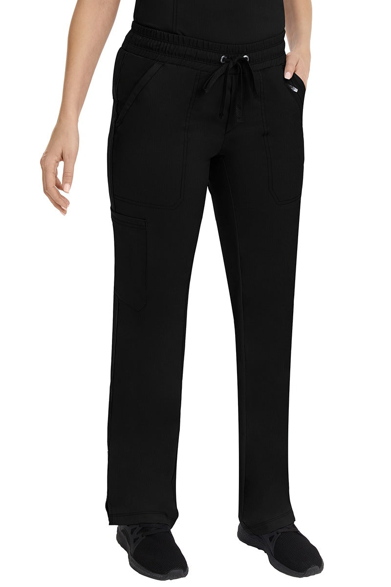 A female LPN wearing a Women's Tanya Drawstring Cargo Scrub Pant from Purple Label by Healing Hands featuring stylish ribbon detail throughout.