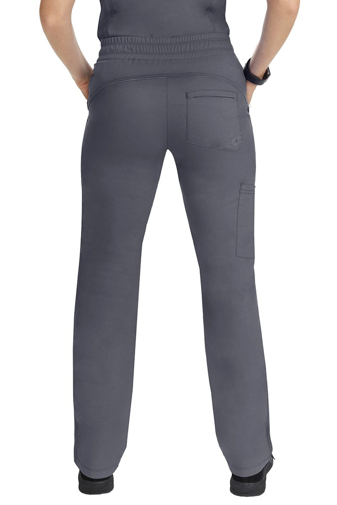 A female healthcare worker wearing a pair of Purple Label Women's Tanya Drawstring Cargo Scrub Pants in Pewter featuring 1 back patch pocket for additional on the go storage needs.