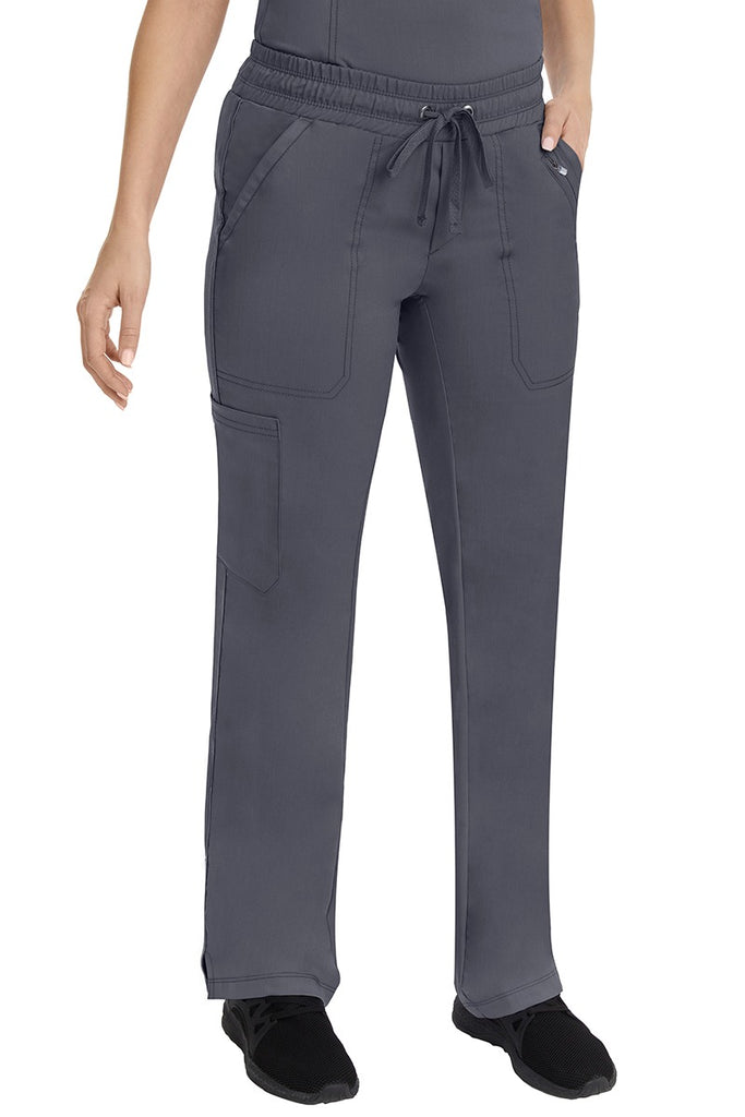 A female LPN wearing a Women's Tanya Drawstring Cargo Scrub Pant from Purple Label by Healing Hands featuring stylish ribbon detail throughout.