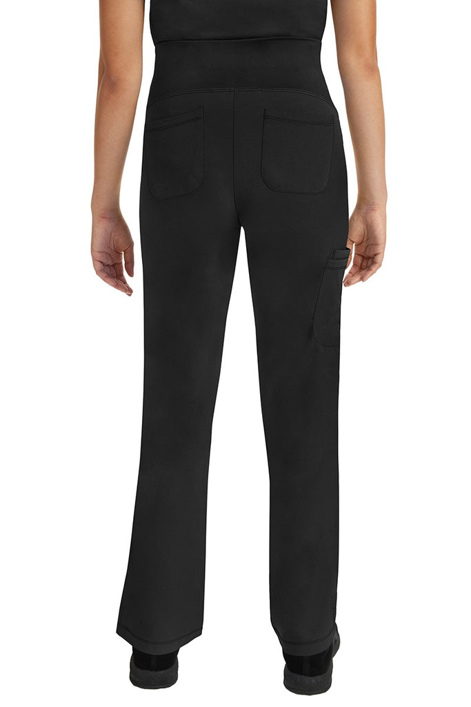 A young nurse wearing a Women's Rose Maternity Cargo Scrub Pant from HH Works in Black featuring two back patch pockets.