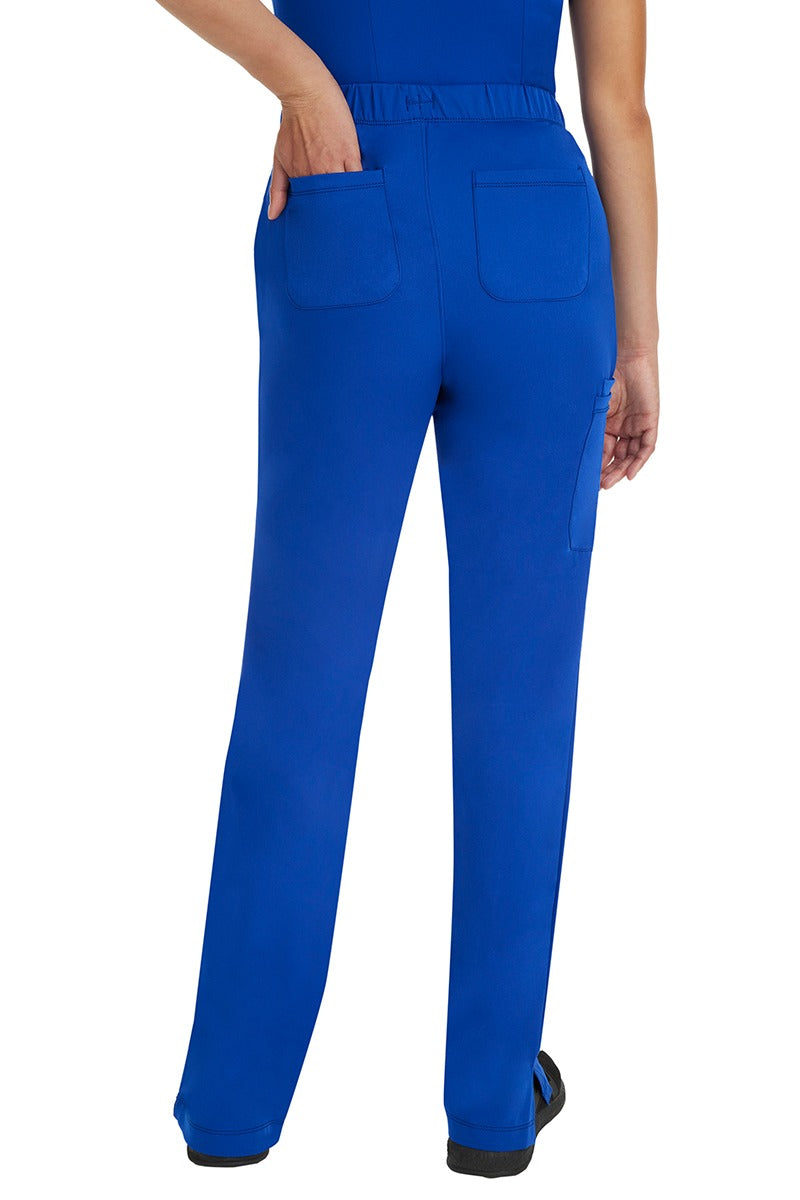 A lady CNA wearing an HH-Works Women's Rebecca Multi-Pocket Drawstring Pant in Galaxy Blue featuring 2 back patch pockets for any additional on the job storage needs.