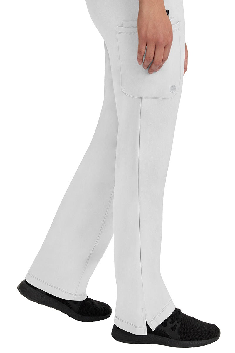 A young woman wearing an HH-Works Women's Rebecca Multi-Pocket Drawstring Pant in White. Perfect for Healthcare Professionals working in Hospitals or as Physical Therapists, Optometrists, & Chiropractors!